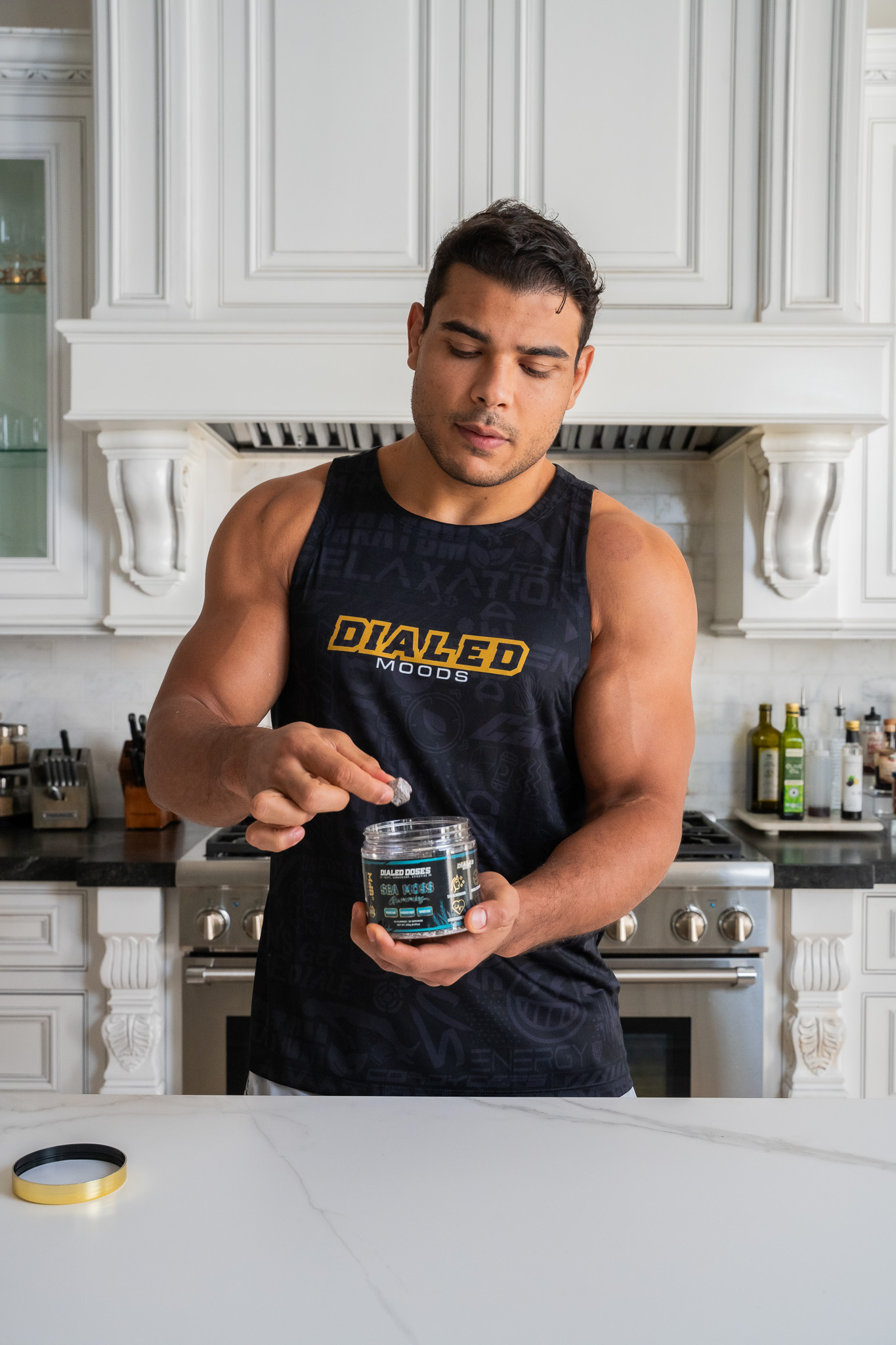 Man in kitchen with product